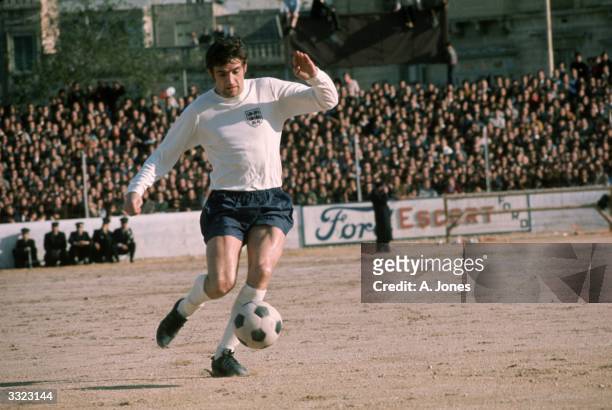 Norman Hunter in action for England during their European Championship qualifying match against Malta at Valletta in Malta.
