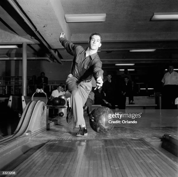 Tenpin bowler from Jamaica High School, New York, aiming for a strike.