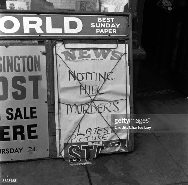News stands carry the headline 'Notting Hill Murders' following the gruesome discoveries at 10 Rillington Place, Notting Hill in London, where...