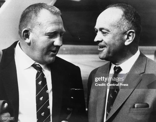 Manager of the Now Zealand All-Blacks Mr Pearce with Doctor Dannie Craven of the South African Springboks at Jan Smuts Airport, Johannesburg, for the...