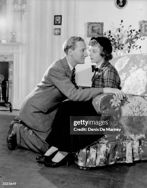 Actors Leslie Phillips and Geraldine Mc Ewan during a performance of 'For Better, For Worse' at London's Comedy Theatre.