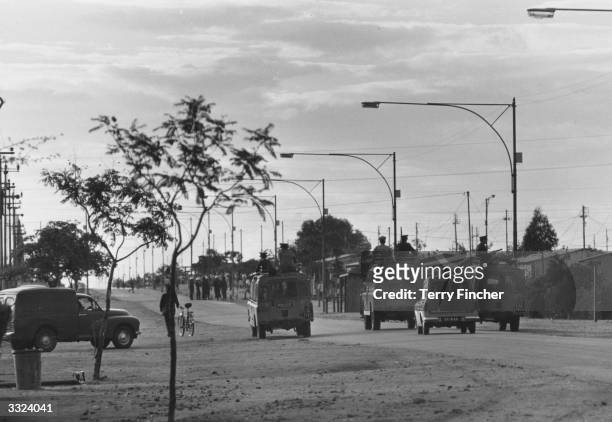 Rhodesian police patrolling the streets of Bulawayo on the roofs of police vans during the Rhodesia Crisis following Ian Smith's Unilateral...
