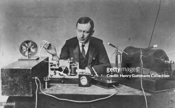 Italian physicist and inventor Guglielmo Marconi at work in his laboratory.