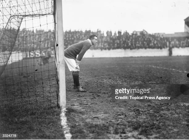 Footballer Roose, goalkeeper of Woolwich Arsenal FC, at the goalmouth during a match against Middlesbrough.