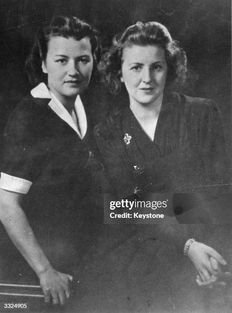 Long-time companion of German dictator Adolf Hitler, Eva Braun with her childhood friend Herta Schneider, circa 1940.