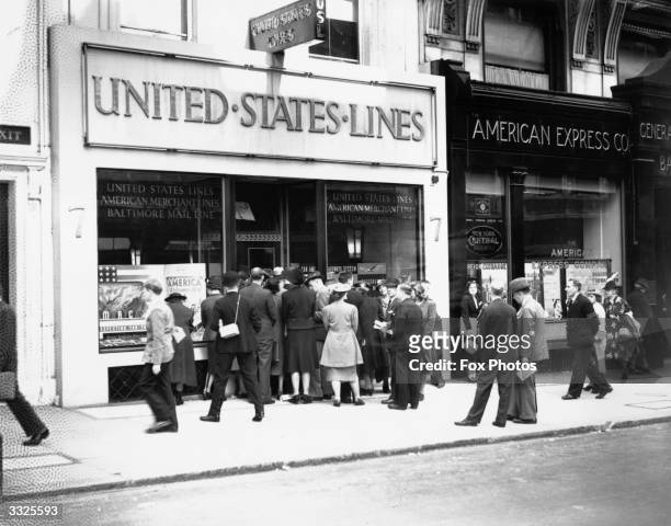 Crowds outside the closed passenger office of the United States Shipping Lines in Haymarket trying to book passages to America.