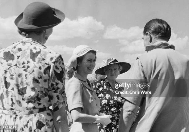 Princess Elizabeth attends a polo match in Nyeri, during a Commonwealth visit to Kenya, 3rd February 1952. The visit would be cut short after the...