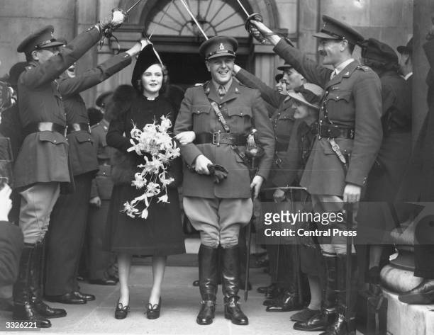 Randolph Churchill and Pamela Digby after their wedding ceremony at St John's Church, Westminster, London.