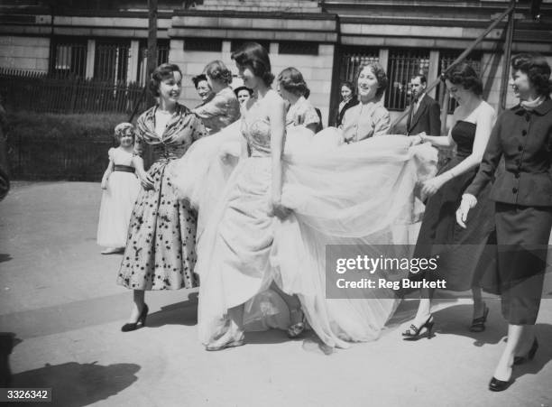 Fashions by Christian Dior are on display in London at a final dress rehearsal for the Berkeley Debutante Dress Show in aid of the NSPCC.