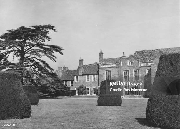 The well kept grounds outside Sutton Place near Guildford, Surrey. Parts of the house, originally the home of the Duke and Duchess of Sutherland,...