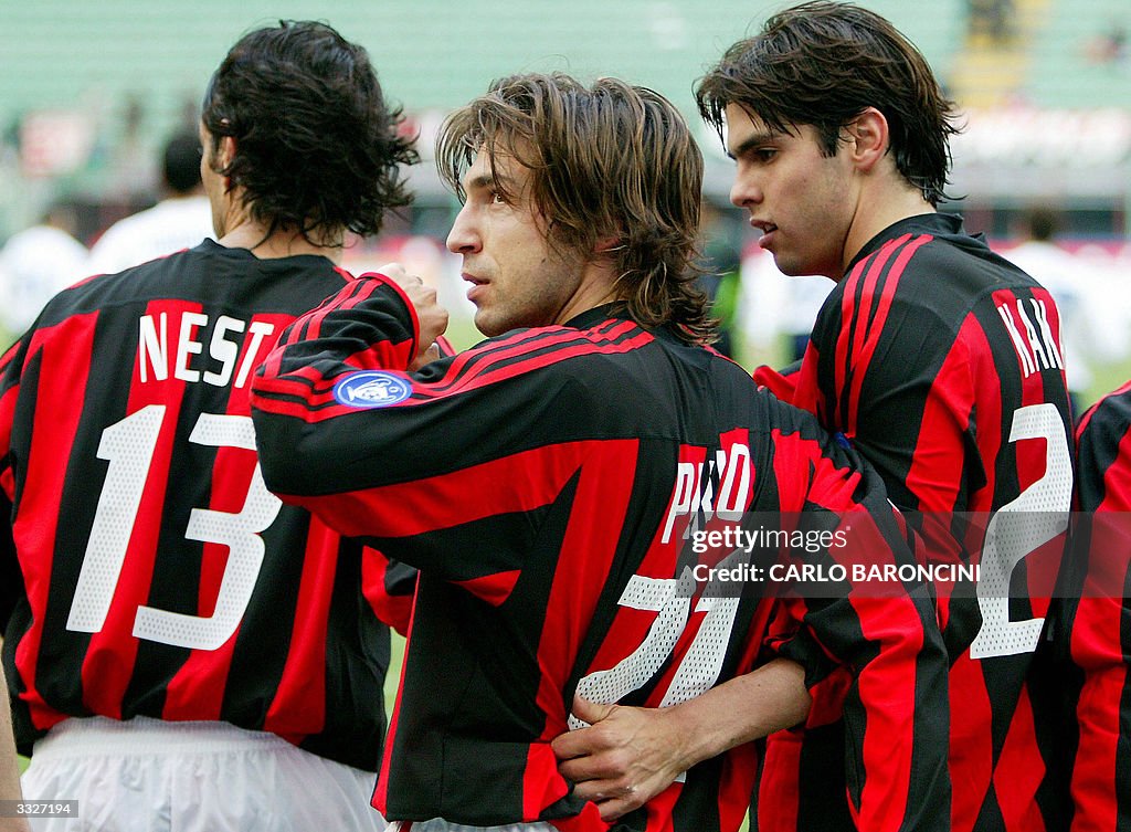 AC Milan's Andrea Pirlo (C) celebrates w