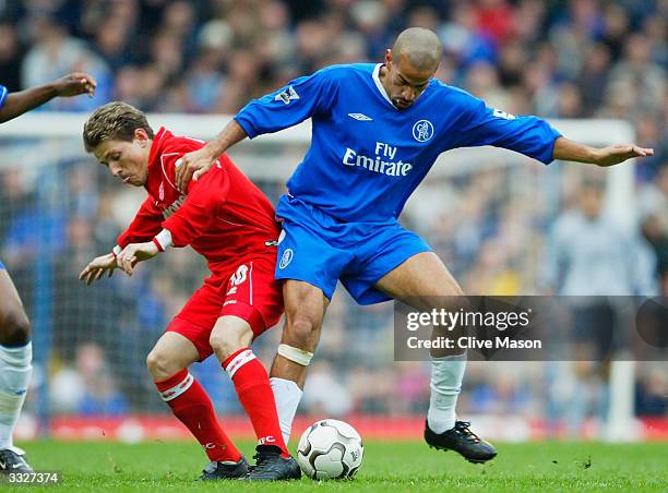 Juan Sebastian Veron of Chelsea battles for the ball with Juninho of Middlesbrough during the FA Barclaycard Premiership match between Chelsea and...