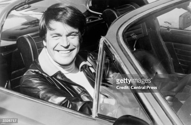 In the driving seat and in character for his TV series ' Hart to Hart' American film and TV star Robert Wagner.