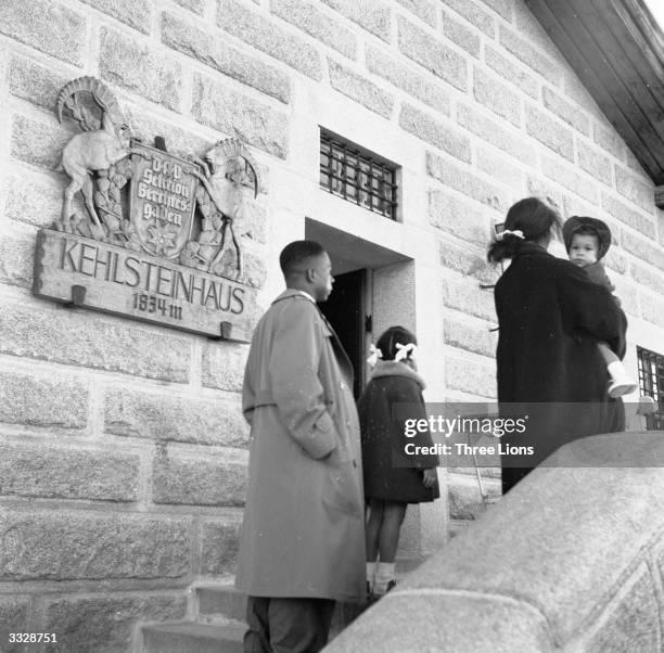 Visitors inspect the Tea House at Kehlstein Mountain in the Bavarian Alps. This was Adolf Hitler's mountain retreat during the heydays of the Third...