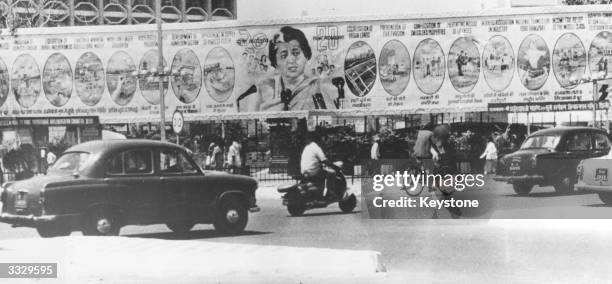 An expansive roadside hoarding in New Delhi featuring the Indian Prime Minister Indira Gandhi and detailing her 20-point economic programme.