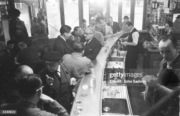 Drinkers in a Parisian bar at the time of the French elections.