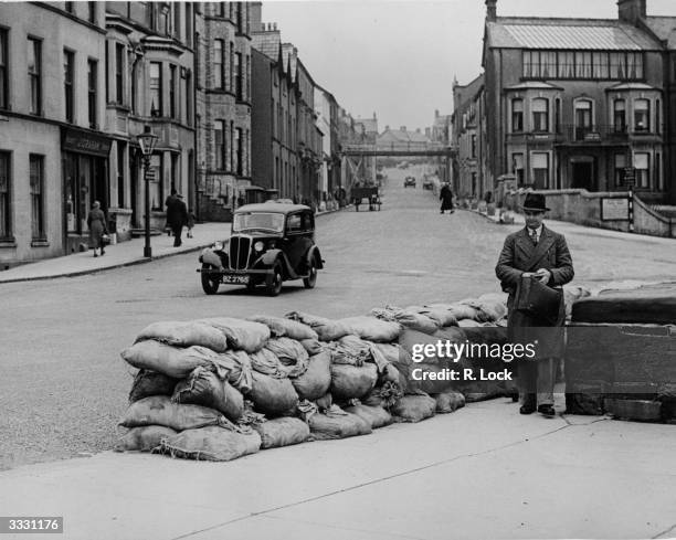 Sandbags in front of the sea wall in Bangor, County Down in preparation for the Round the Houses Motor Car Race organised by the Ulster Automobile...