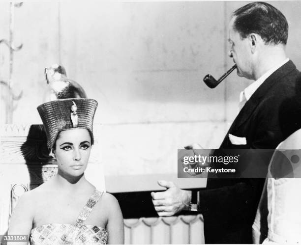 American film director Joseph L Mankiewicz with American actress Elizabeth Taylor on the set of his film 'Cleopatra'.