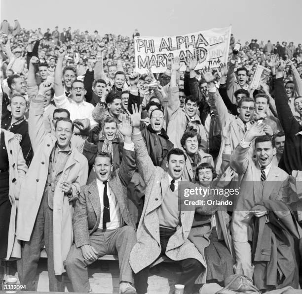 University of Maryland American football supporters raising a shout for their team.