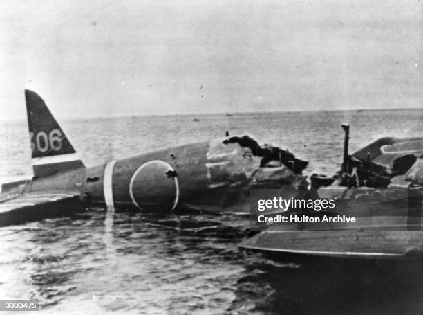 Wrecked Japanese war plane floating in the water after it had been shot down during the Battle of the Coral Sea.