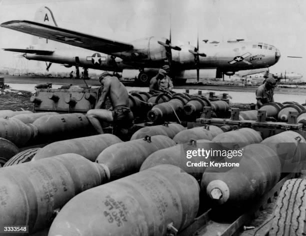 'Dauntless Dottie,' one of America's B29 Superfortress bombers, is made ready for a bombing run on Tokyo. Here on Saipan Island, in the Mariana...