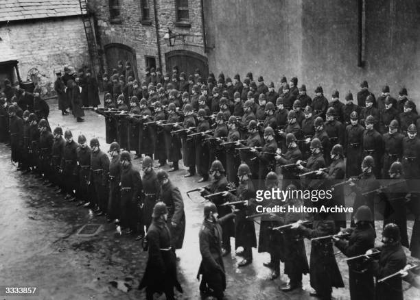 Men of the Royal Irish Constabulary under inspection at Derry city during the by-election.