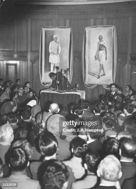 India's high commissioner in London, Krishna Menon, signs the Oath of Allegiance to the Indian constitution at a ceremony at India House, Aldwych,...