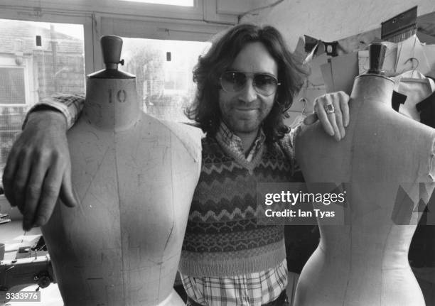 English fashion designer Ossie Clark , aged 29, in his studio.