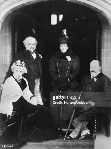 British statesman William Ewart Gladstone and his wife Catherine with the future King Edward VII and Queen Alexandra in the Golden Wedding Porch at...