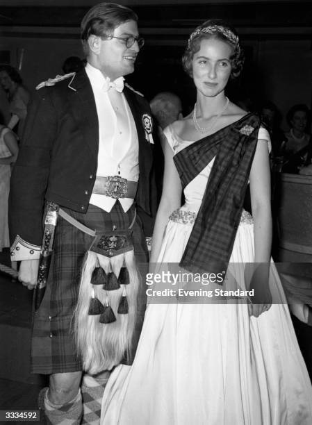The Earl and Countess of Mansfield dressed in traditional Scottish garb at the Royal Caledonian Ball.