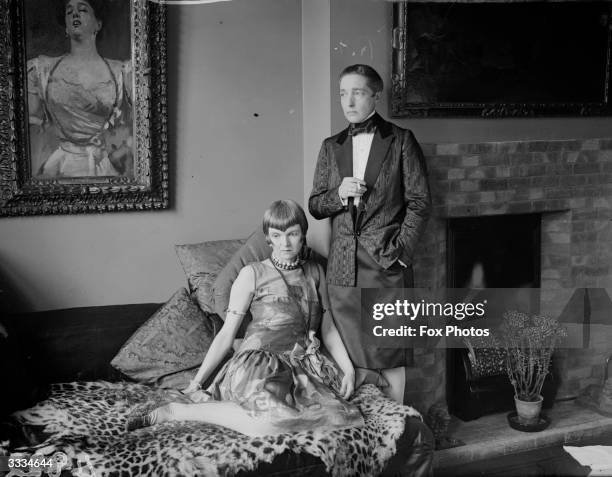 English poet and author, Marguerite Radclyffe Hall with British sculptor and translator, Lady Una Troubridge , August 1927. On the left is John...