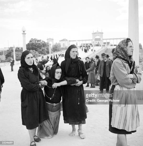 Pilgrims to the Basilica at Fatima, Portugal, will walk the last part of their journey - sometimes on their Knees.