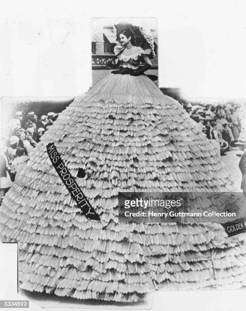 Woman, chosen as Miss Prosperity, wearing a huge dress made of bonds to promote President Franklin D Roosevelt's New Deal plan for national recovery...