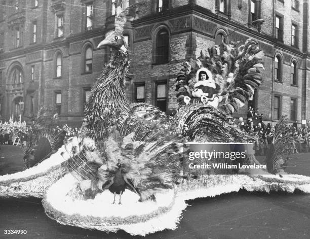 The peacock float making its debut in the Macy's Thanksgiving Day Parade in New York City, 26th November 1961.