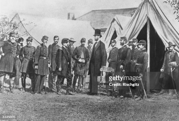 President Abraham Lincoln visiting soldiers encamped at the Civil War battlefield of Antietam in Maryland. It was one of the bloodiest in the whole...