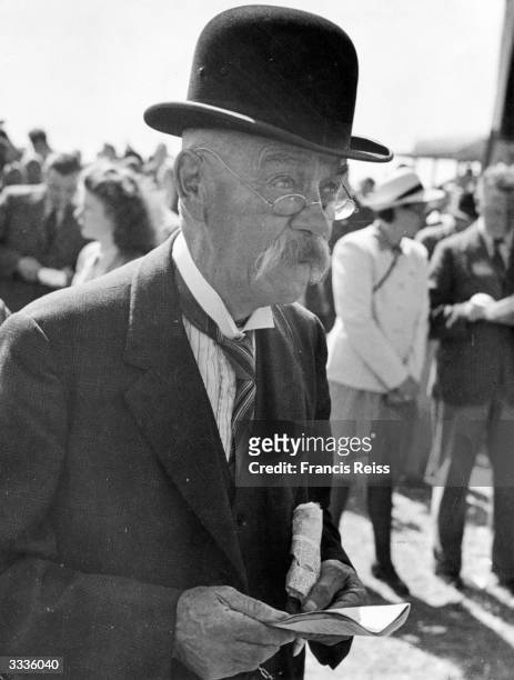 Spectator at the Galway Horse Races in Ireland. Original Publication: Picture Post - 2082 - Off To The Galway Races - pub. 1st September 1945