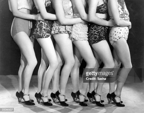 Shapely legs belonging to the chorus girls appearing in the show ...