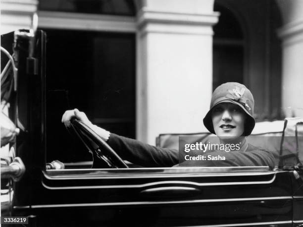 English actress Gertrude Lawrence in the La Salle V8 that was made especially for her.