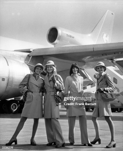 Group of air hostesses model the new uniforms designed by Mary Quant for the stewardesses of Court Line Aviation. The fashion show takes place at...