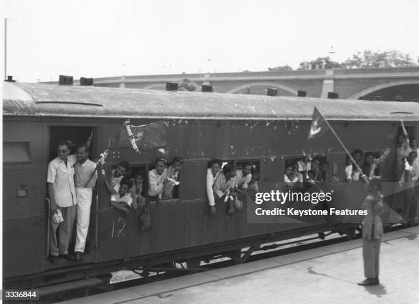 One of 30 special trains leaving New Delhi Station which will take the staff of the Pakistan government to Karachi. Muslim League National Guards...