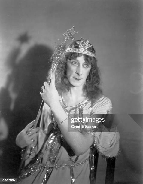 British character actor Ernest Thesiger dressed as a fairy queen at Ivor Novello's birthday party.