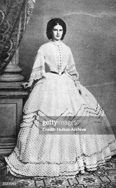 Empress of Austria, Elisabeth Amalie Eugenie , wearing a crinoline dress.