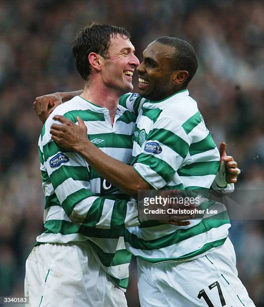 Chris Sutton of Celtic celebrates scoring their third goal with Didier Agathe during the Tennents Scottish FA Cup Semi Final match between Livingston...