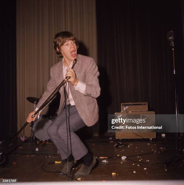 British musician Mick Jagger of the rock band the Rolling Stones, performs in concert, circa 1960s.