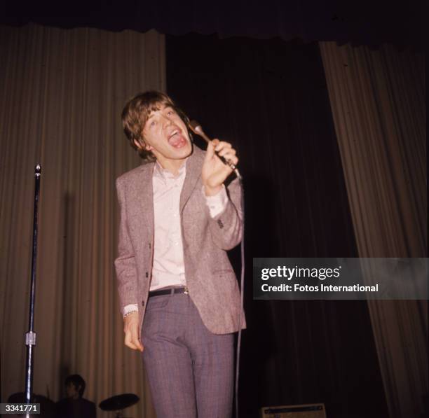 British musician Mick Jagger of the rock band the Rolling Stones, performs in concert, circa 1960s.
