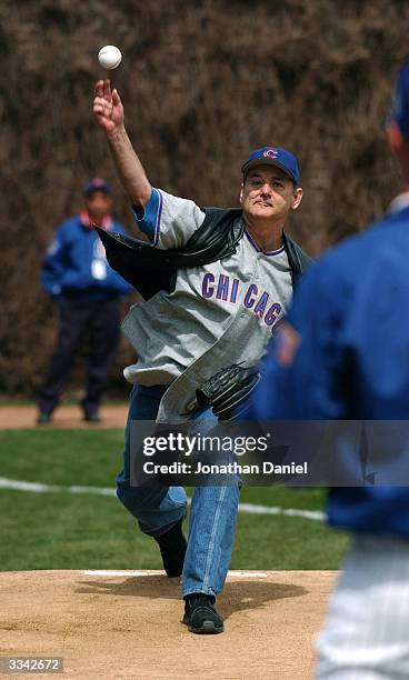 Celebrity Bill Murray takes a warm-up throw before the opening day game between the Chicago Cubs and the Pittsburgh Pirates on April 12, 2004 at...