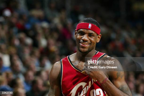 LeBron James of the Cleveland Cavaliers smiles during the game against the Milwaukee Bucks at the Bradley Center on April 2, 2004 in Milwaukee,...