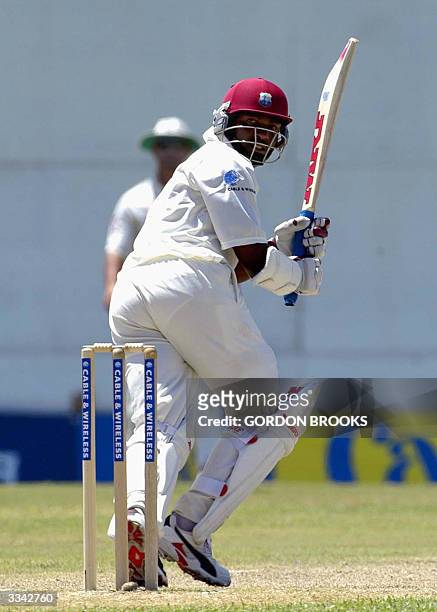 West Indies captain Brian Lara leg-glancing en route to his undefeated 400 on the third day of the fourth and final C&W Test against England 12 April...