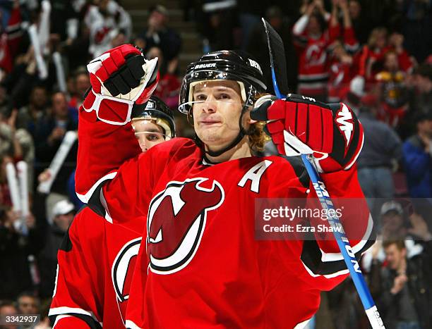 Patrik Elias of the New Jersey Devils celebrates after scoring his second goal against the Philadelphia Flyers in game three of the Eastern...