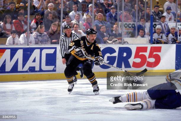 Forward Bryan Trottier of the Pittsburgh Penguins moves against the Buffalo Sabres on January 7, 1994 at Memorial Auditorium in Buffalo, New York.
